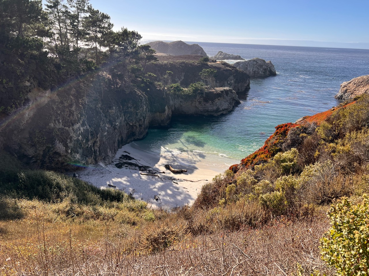 A sheltered cove between cliffs