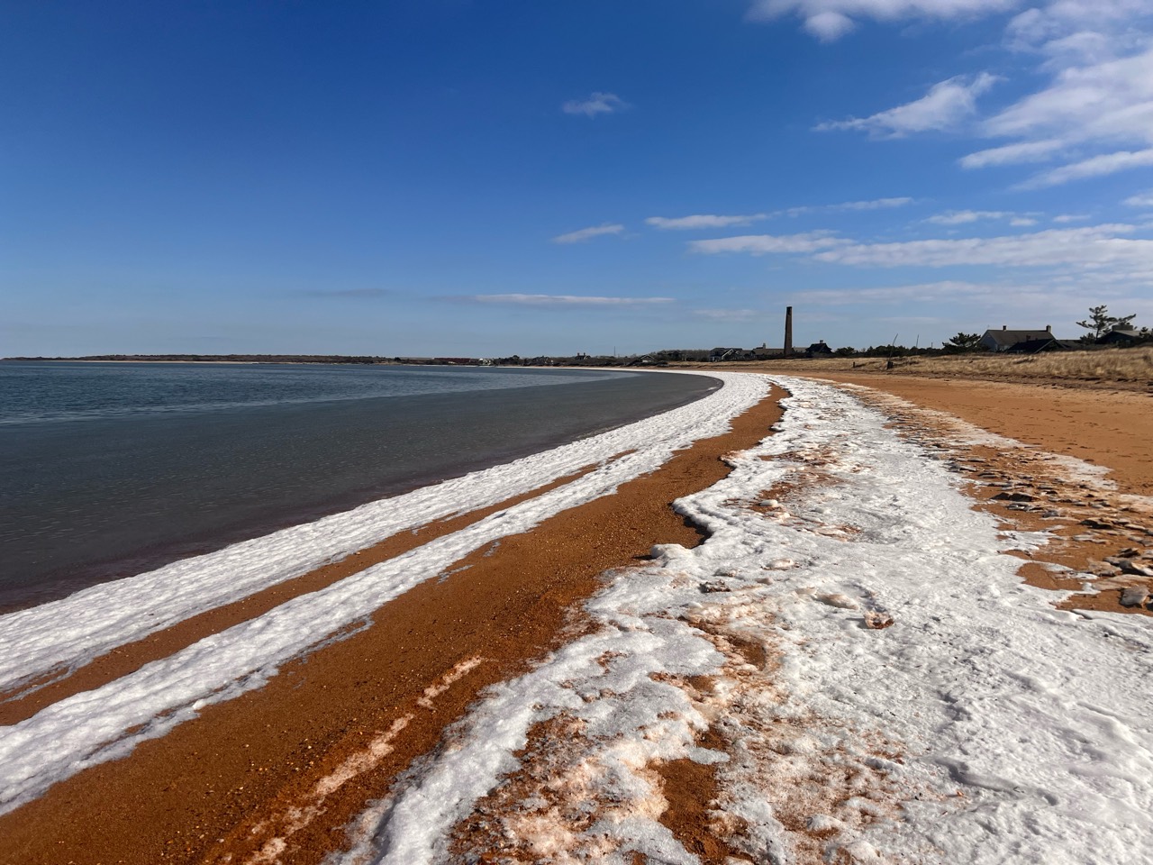 snow lined bay beach